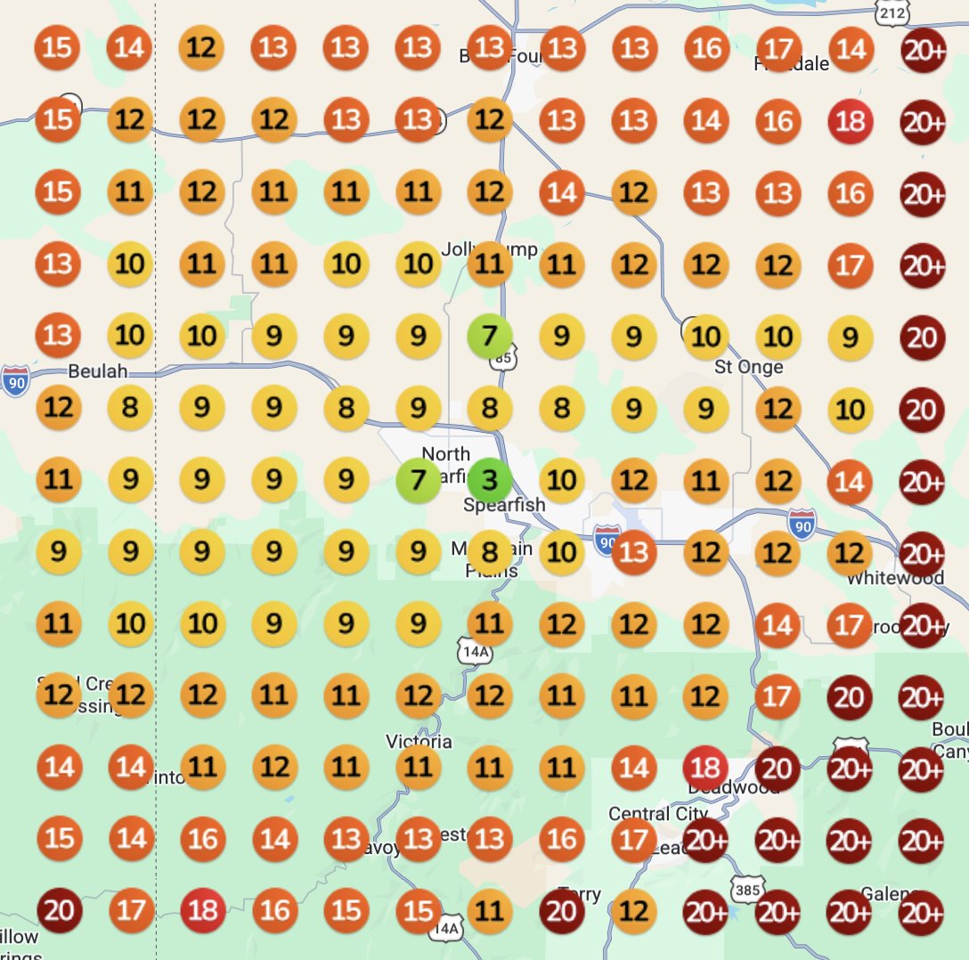 Geo grid before our build: rankings of 9 to 20+ around Spearfish, shown in orange and red